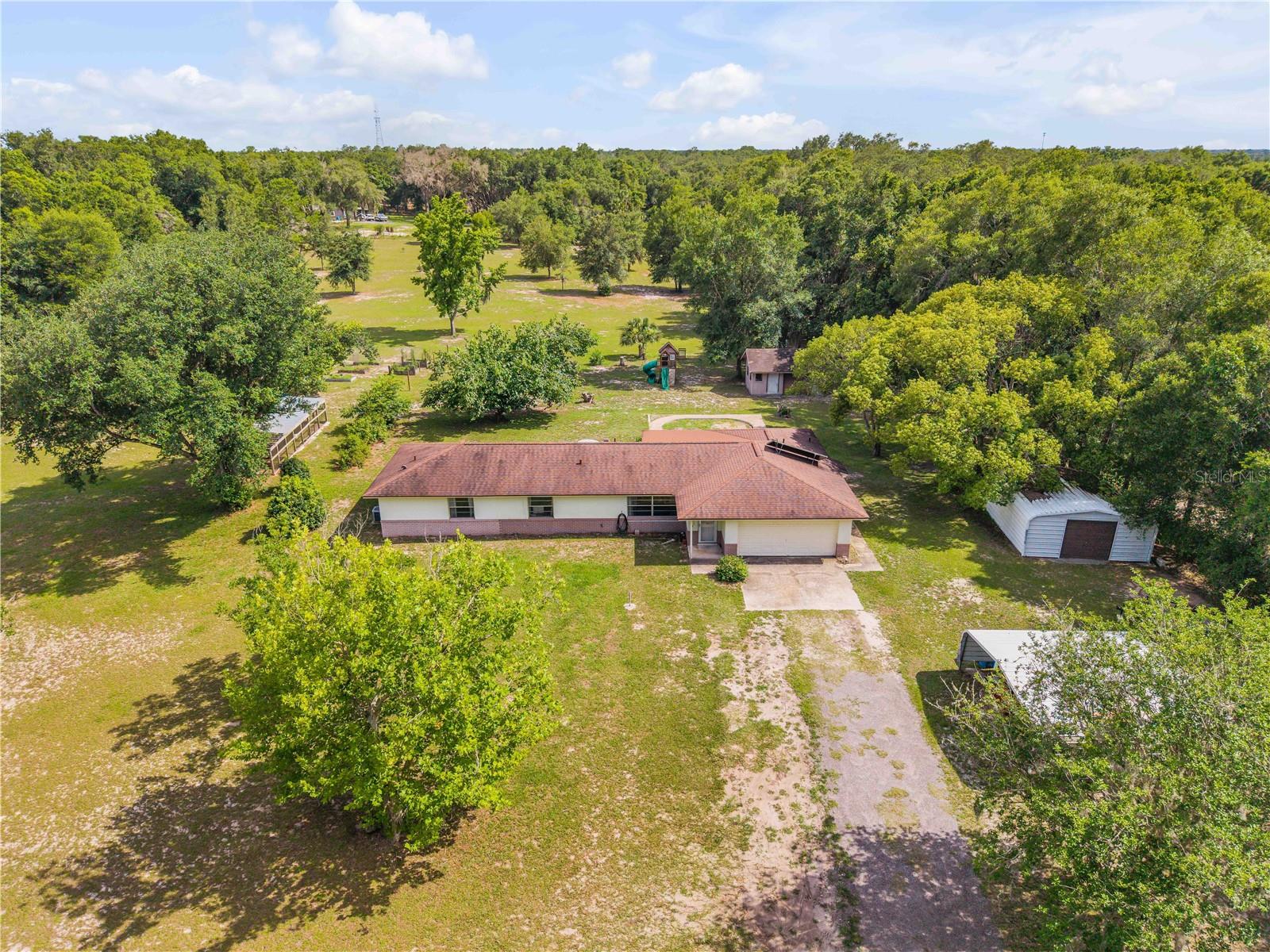 Single Family Residence em DE LEON SPRINGS, FL - Daniel Dourado