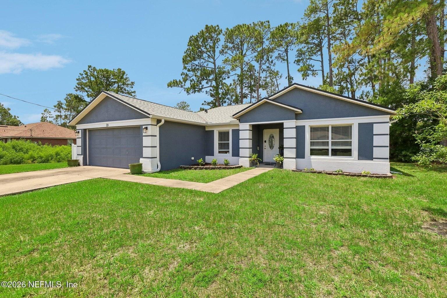 Single Family Residence in PALM COAST, FL - Daniel Dourado