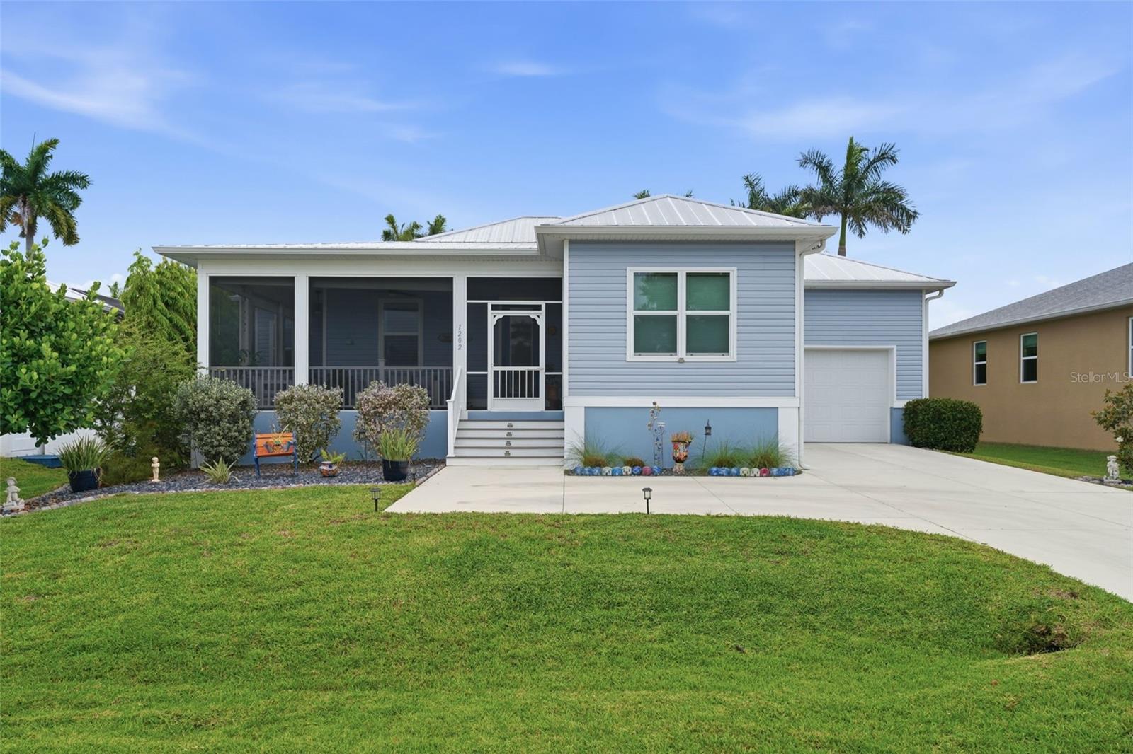 Single Family Residence in PUNTA GORDA, FL - Daniel Dourado