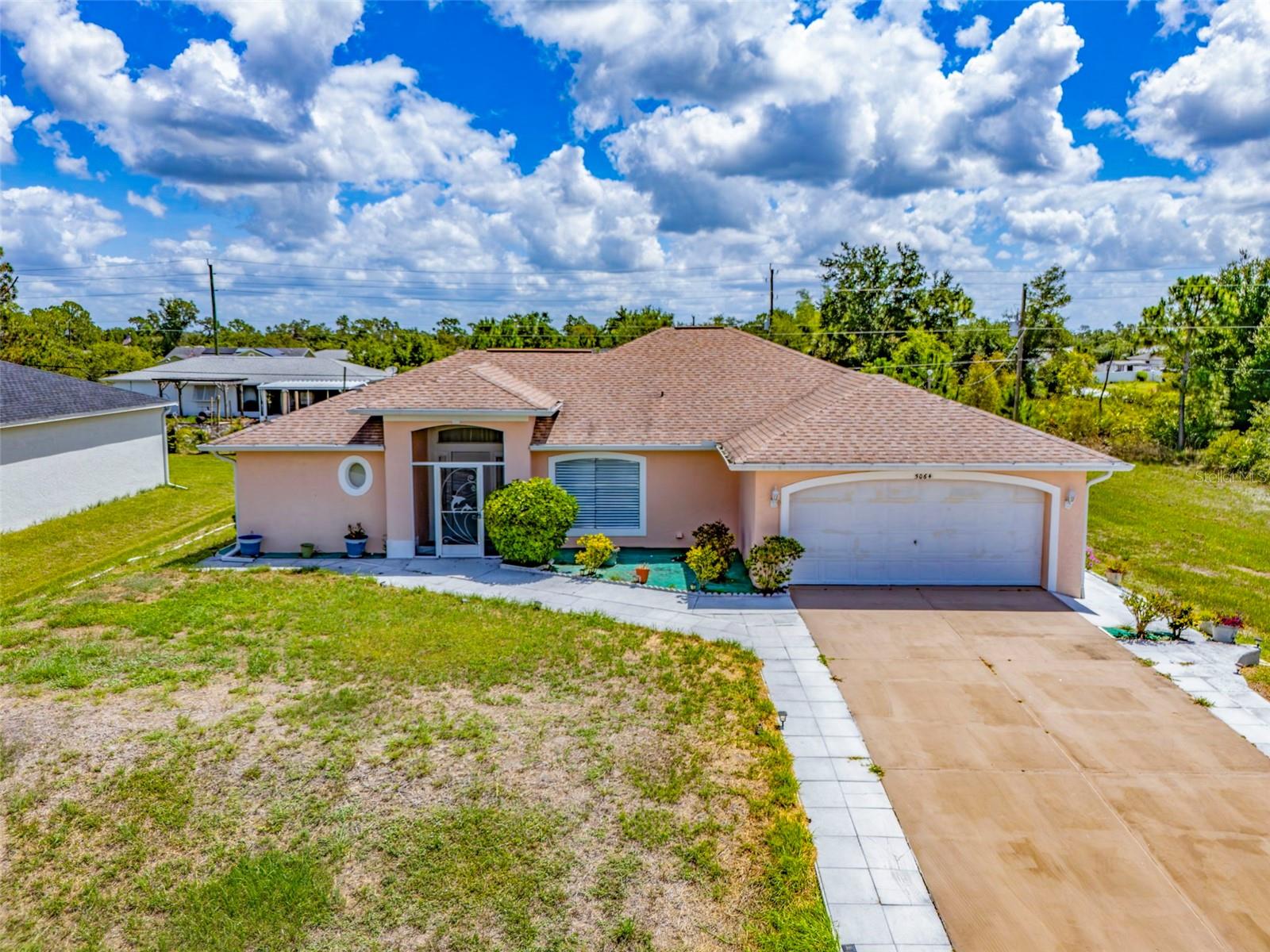 Single Family Residence in PORT CHARLOTTE, FL - Daniel Dourado