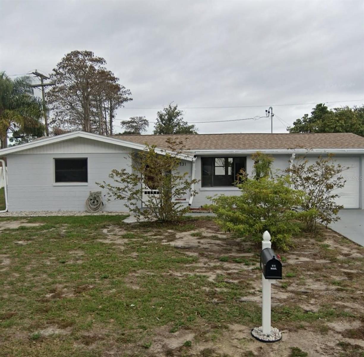 Single Family Residence em HOLIDAY, FL - Daniel Dourado