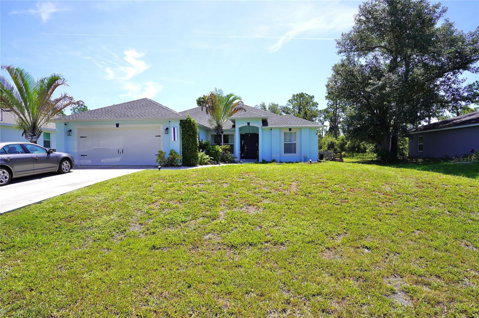 Single Family Residence in PORT CHARLOTTE, FL - Daniel Dourado