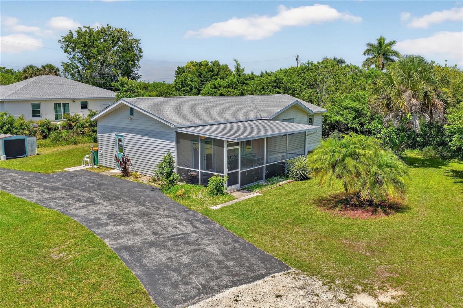 Single Family Residence in PUNTA GORDA, FL - Daniel Dourado
