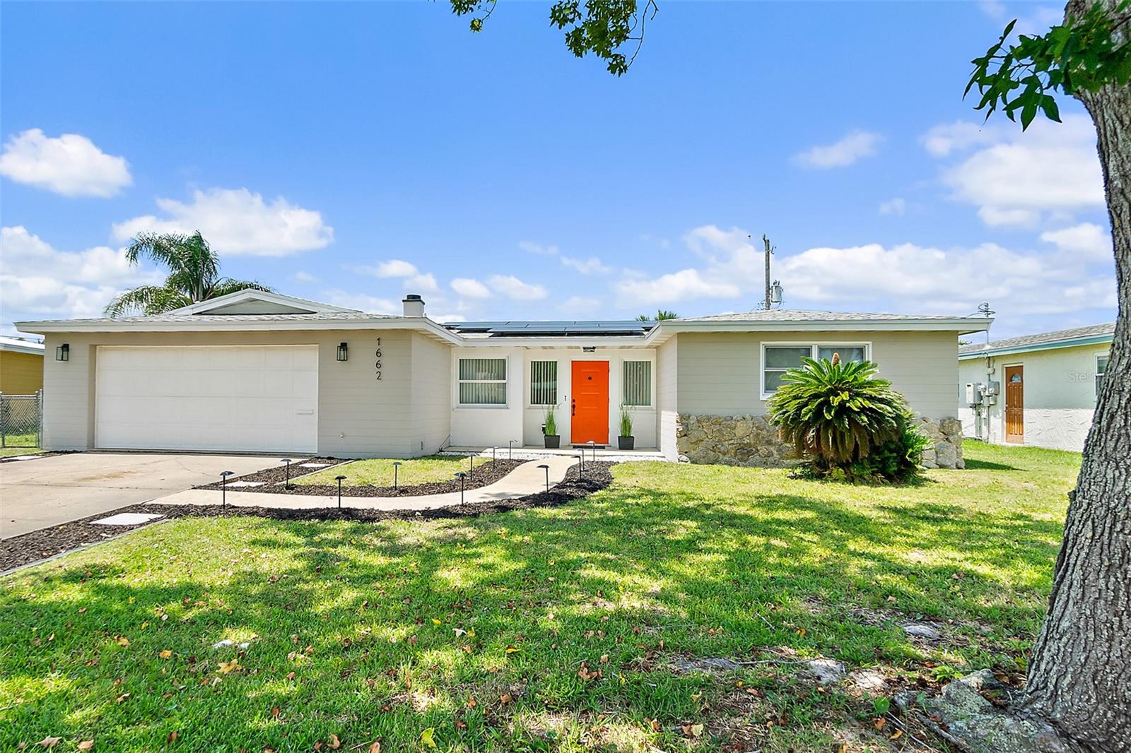 Single Family Residence em SOUTH DAYTONA, FL - Daniel Dourado