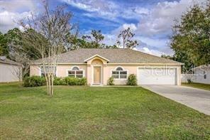 Single Family Residence in PALM COAST, FL - Daniel Dourado