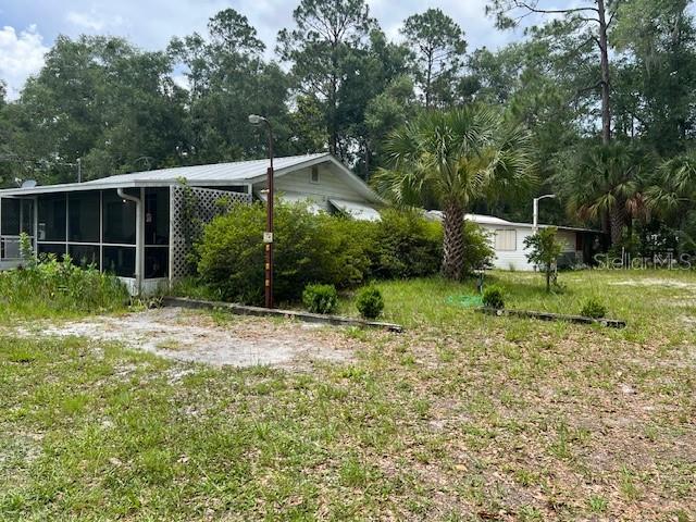 Single Family Residence in CROSS CITY, FL - Daniel Dourado