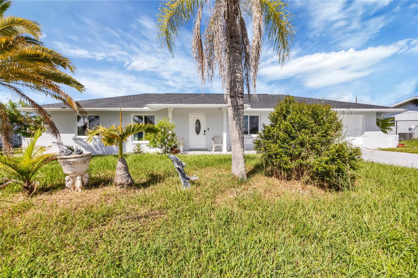 Single Family Residence em PORT CHARLOTTE, FL - Daniel Dourado