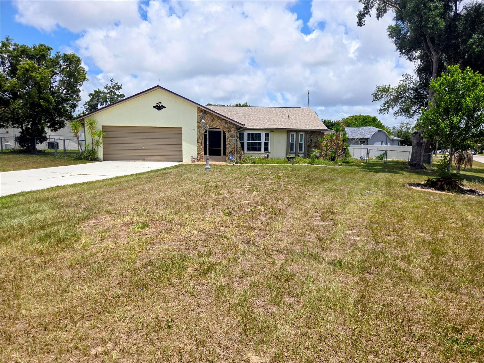 Single Family Residence in SPRING HILL, FL - Daniel Dourado