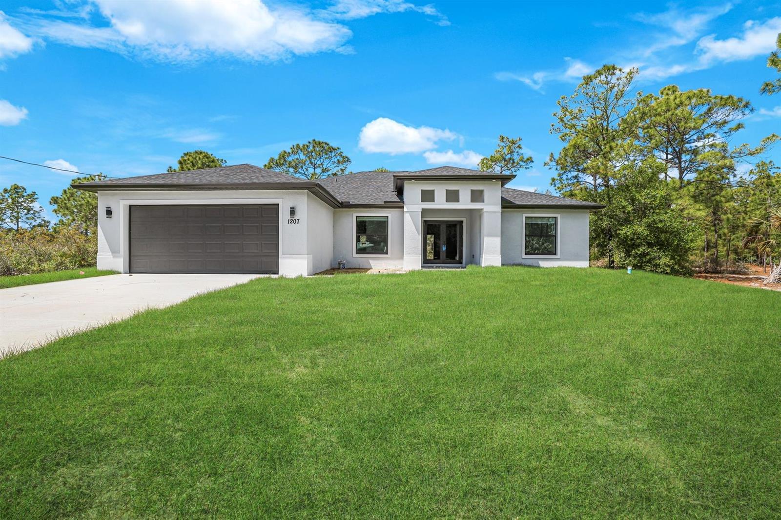 Single Family Residence in LEHIGH ACRES, FL - Daniel Dourado