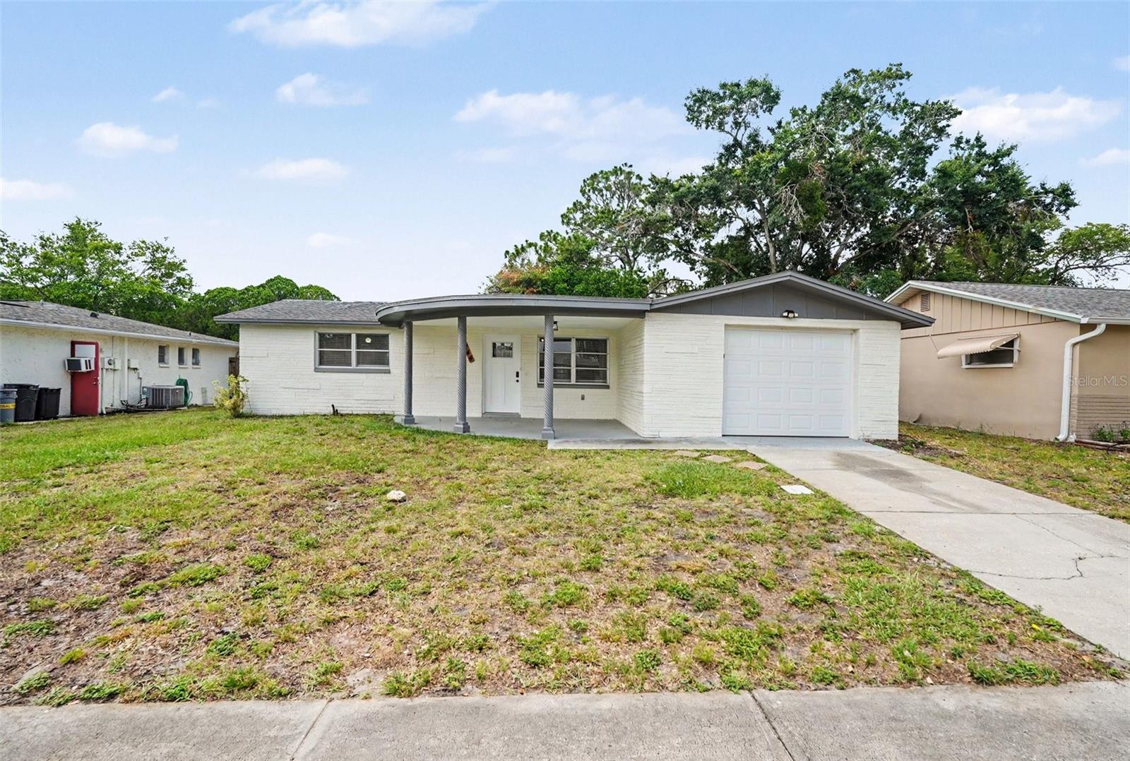 Single Family Residence in NEW PORT RICHEY, FL - Daniel Dourado