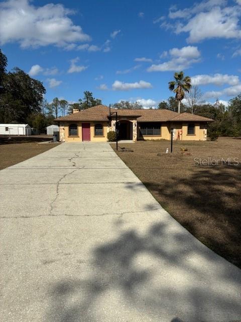 Single Family Residence in DUNNELLON, FL - Daniel Dourado