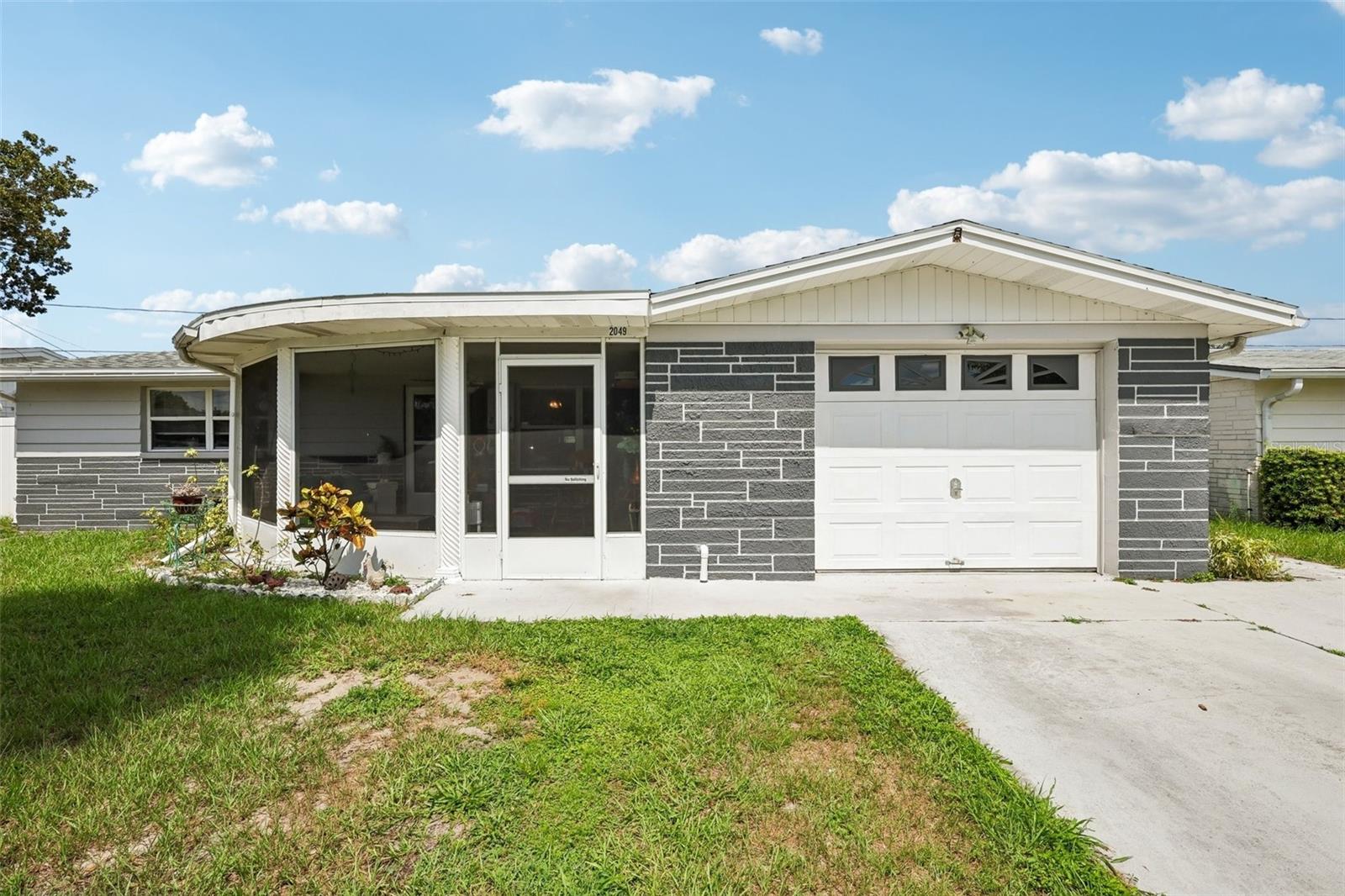 Single Family Residence em HOLIDAY, FL - Daniel Dourado