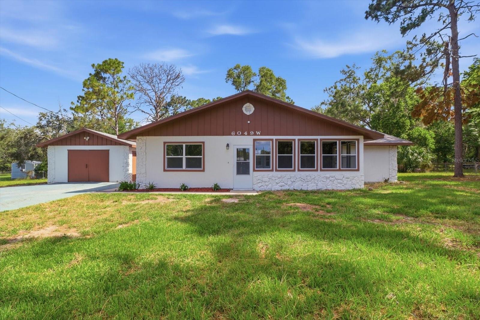 Single Family Residence em HOMOSASSA, FL - Daniel Dourado