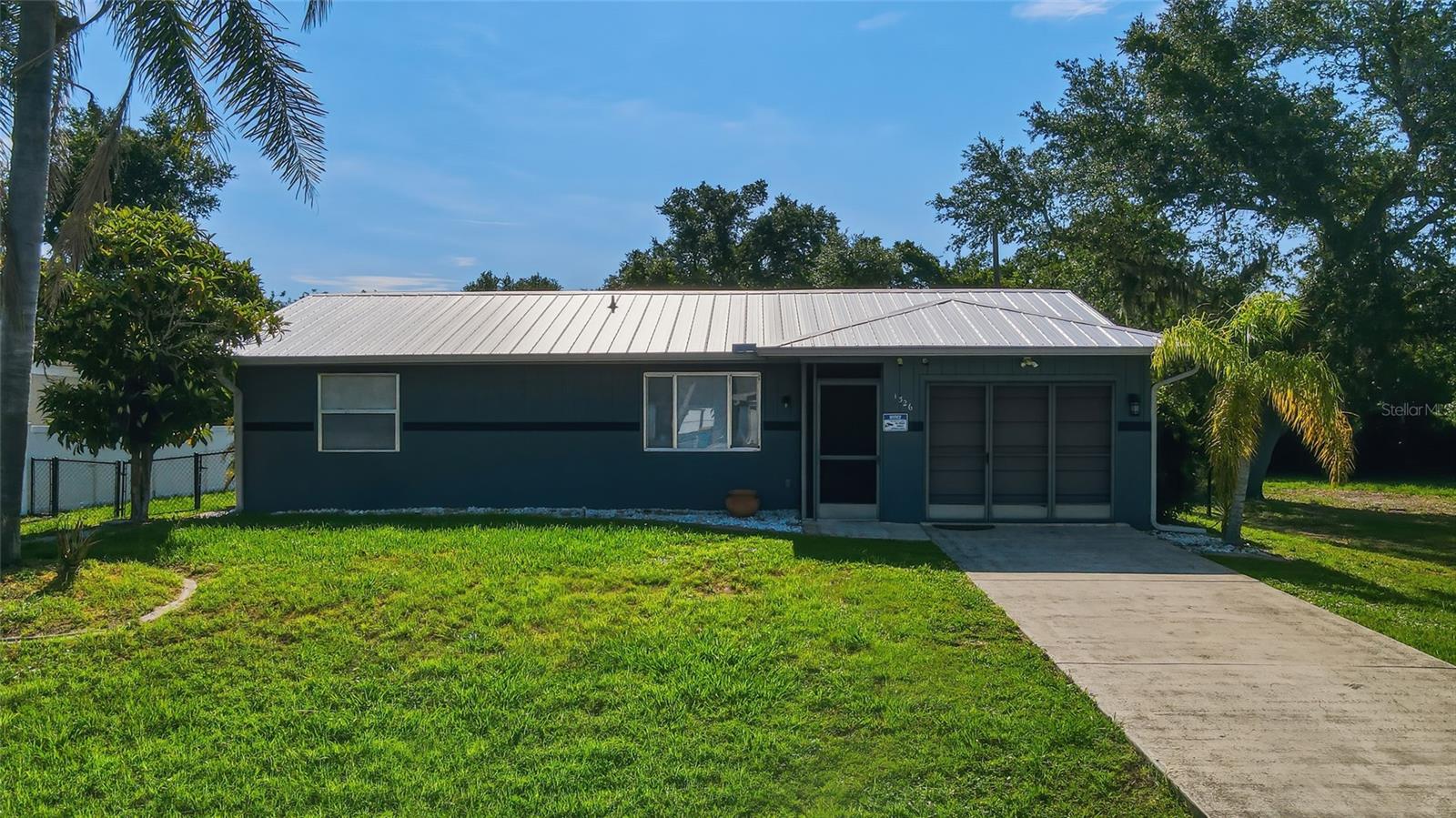 Single Family Residence em PORT CHARLOTTE, FL - Daniel Dourado