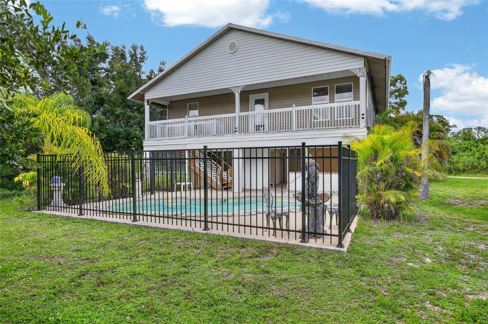Single Family Residence em PORT CHARLOTTE, FL - Daniel Dourado