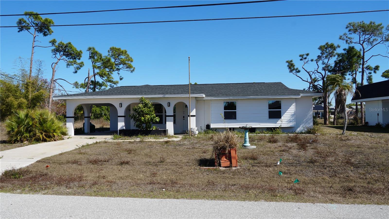 Single Family Residence em PORT CHARLOTTE, FL - Daniel Dourado