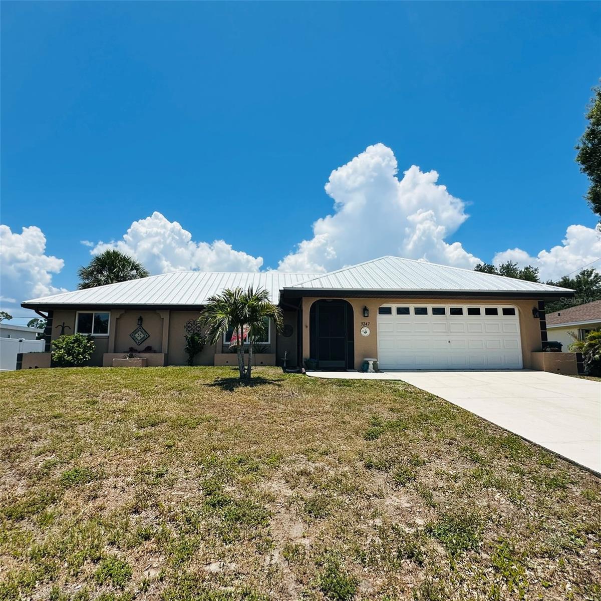 Single Family Residence em PORT CHARLOTTE, FL - Daniel Dourado