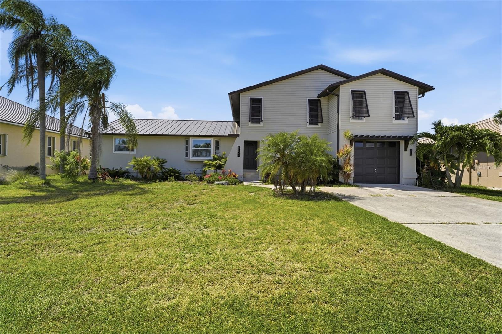 Single Family Residence em PUNTA GORDA, FL - Daniel Dourado