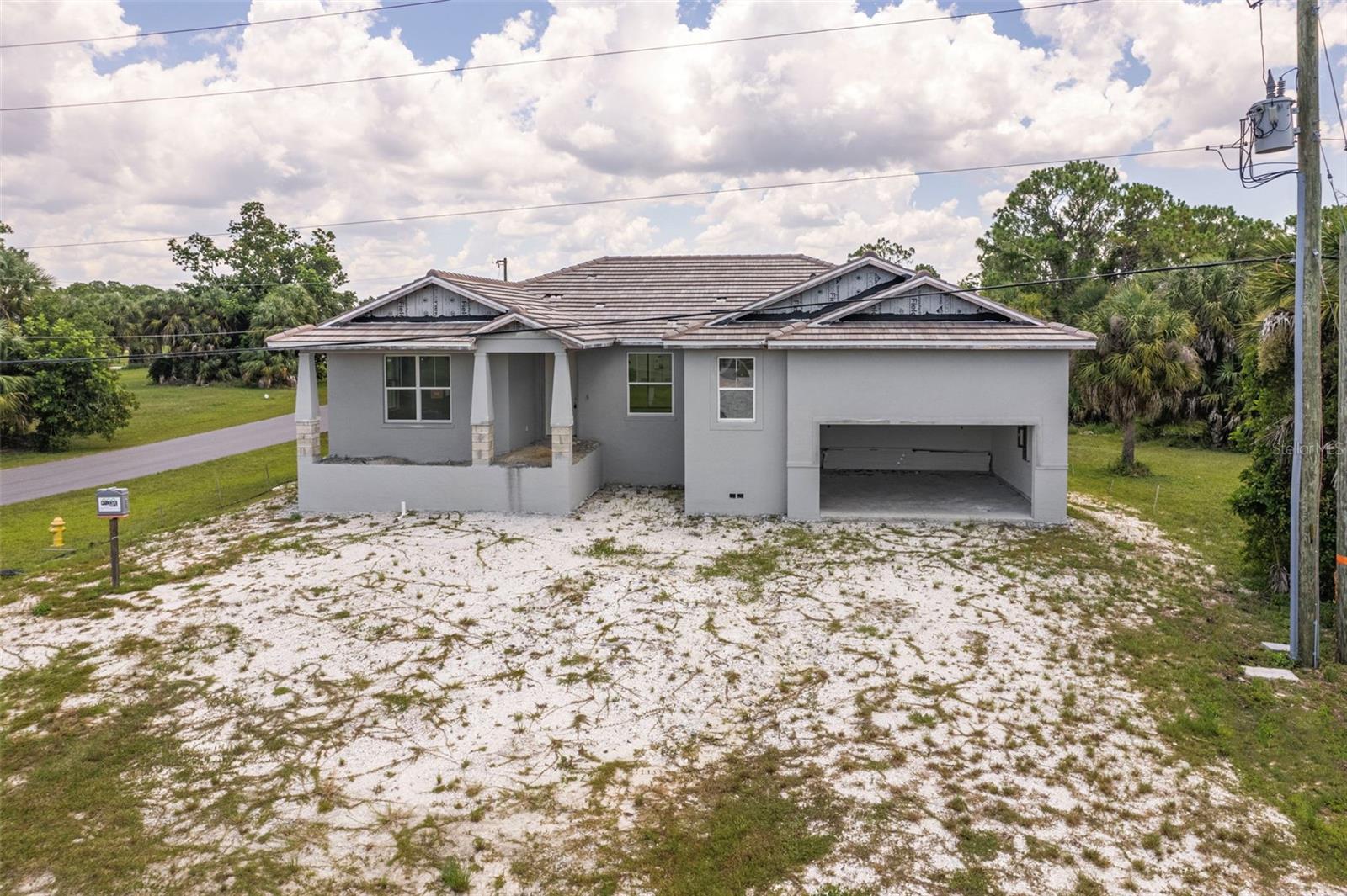 Single Family Residence em PUNTA GORDA, FL - Daniel Dourado