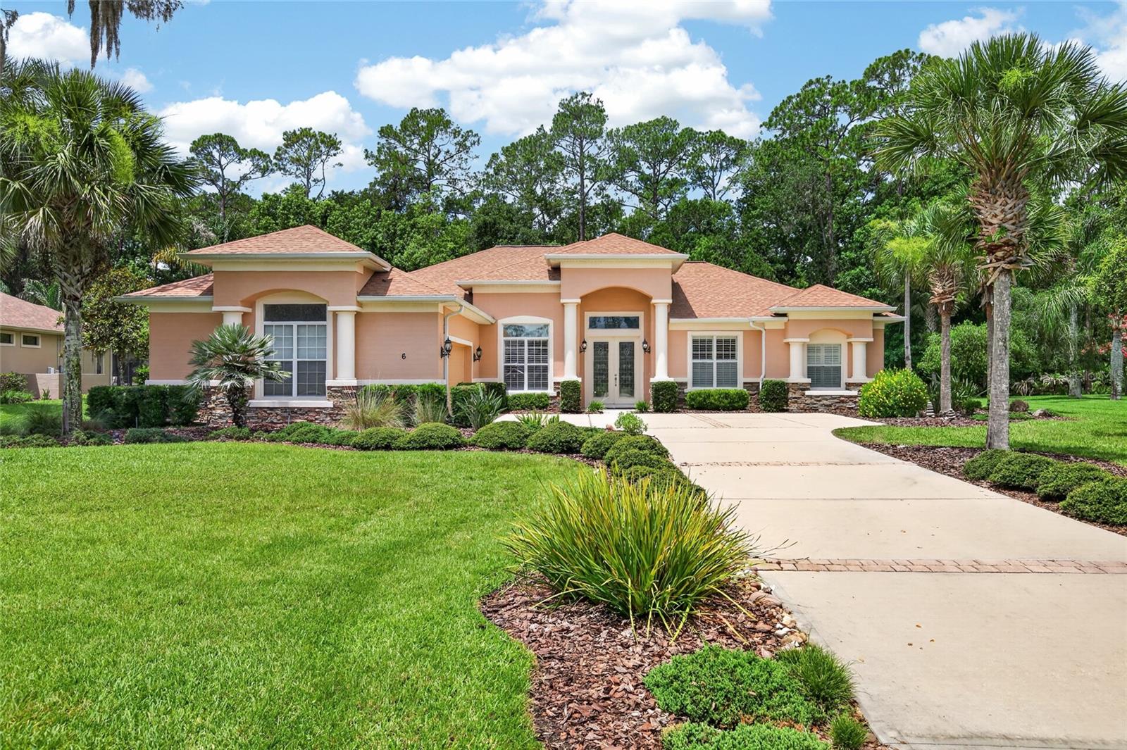 Single Family Residence in PALM COAST, FL - Daniel Dourado
