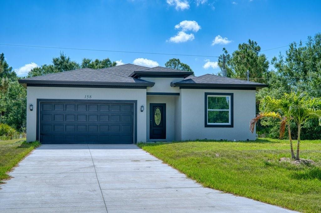 Single Family Residence em PORT CHARLOTTE, FL - Daniel Dourado