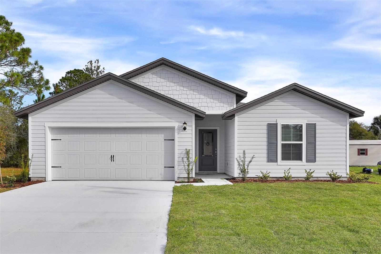 Single Family Residence in PALM COAST, FL - Daniel Dourado