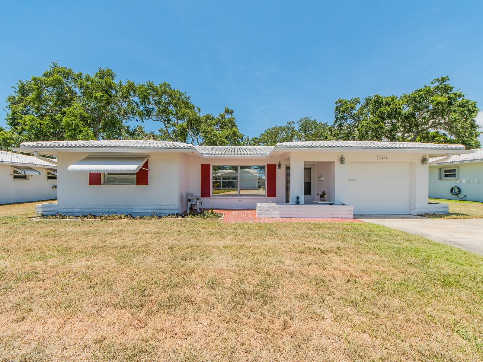 Single Family Residence em SEMINOLE, FL - Daniel Dourado