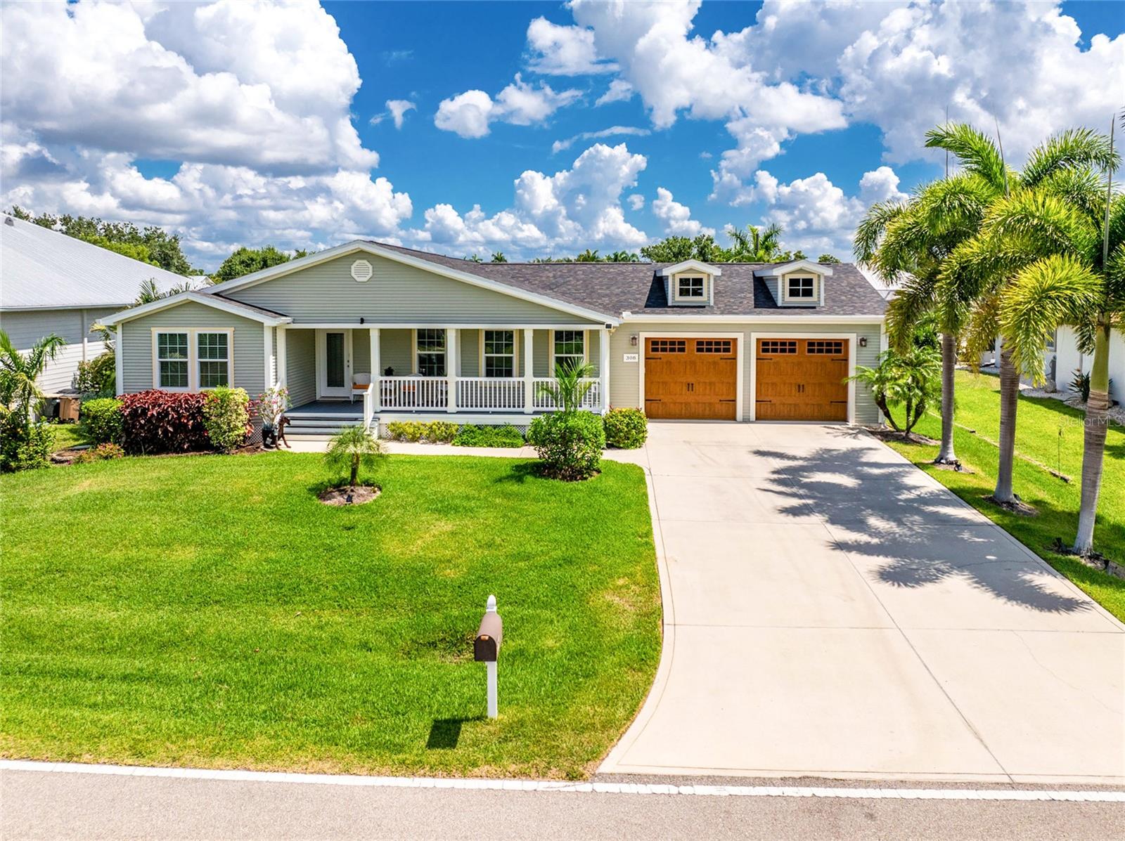 Single Family Residence em PUNTA GORDA, FL - Daniel Dourado