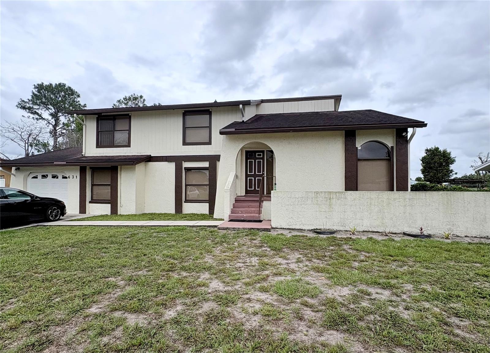 Single Family Residence em KISSIMMEE, FL - Daniel Dourado