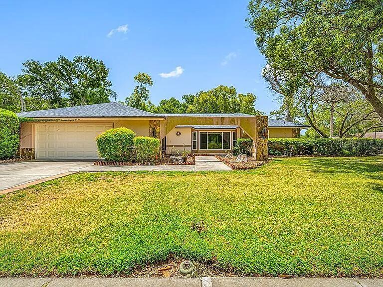 Single Family Residence in PALM HARBOR, FL - Daniel Dourado