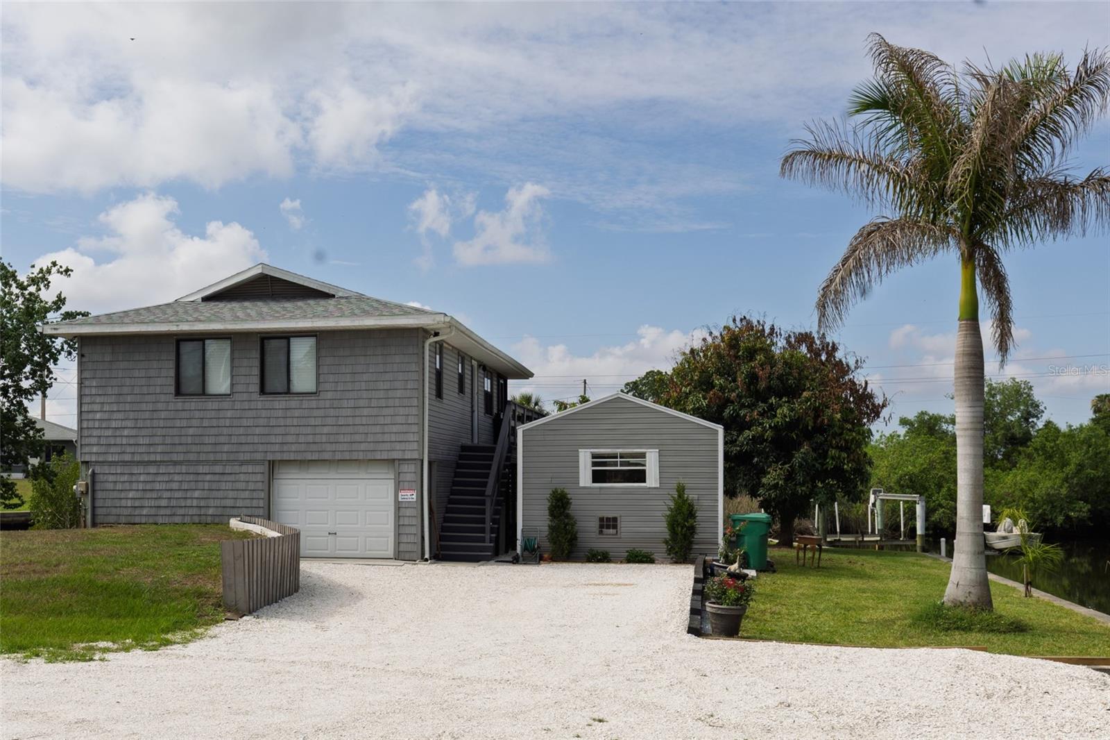 Single Family Residence em PUNTA GORDA, FL - Daniel Dourado