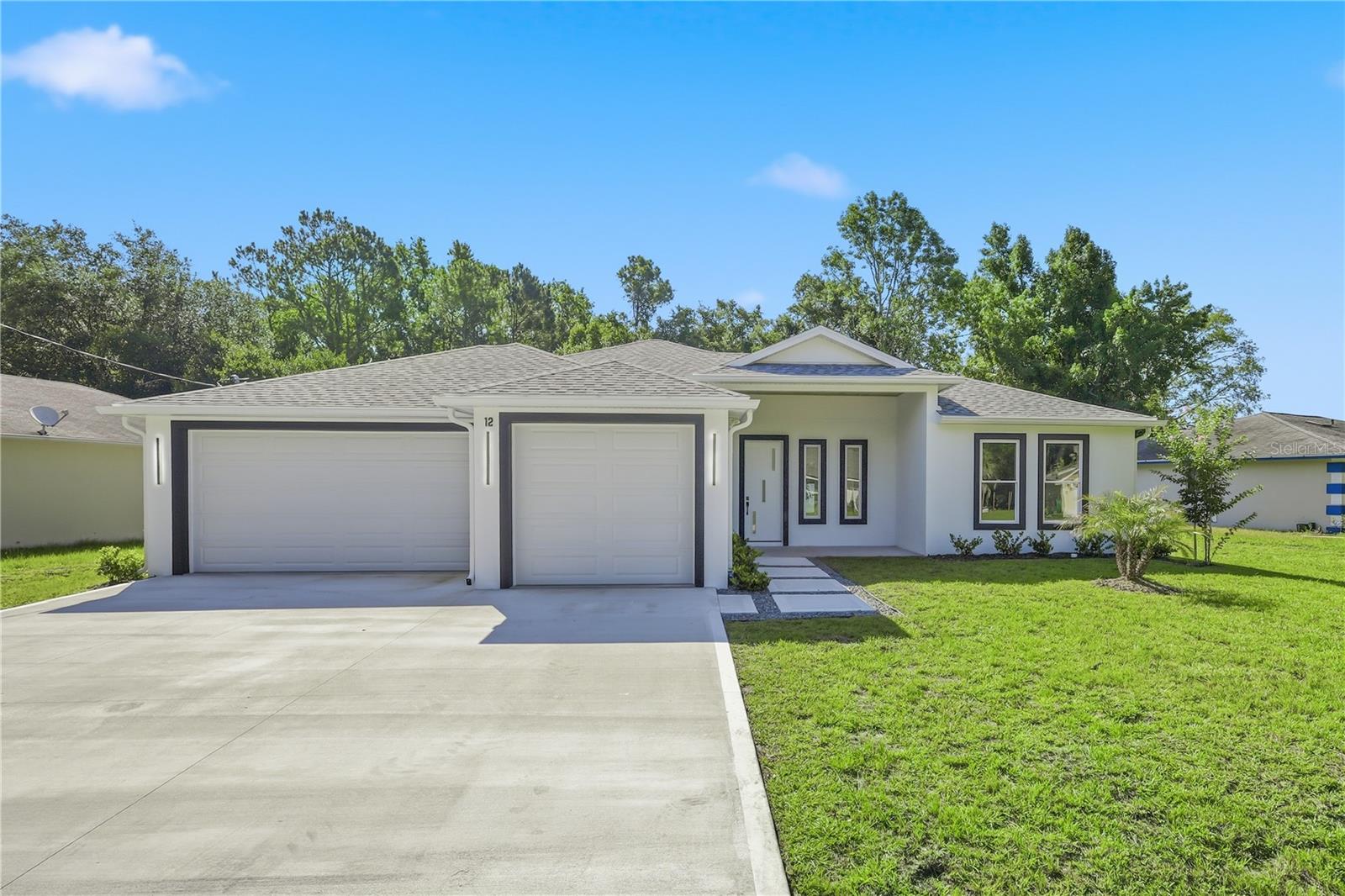 Single Family Residence em PALM COAST, FL - Daniel Dourado