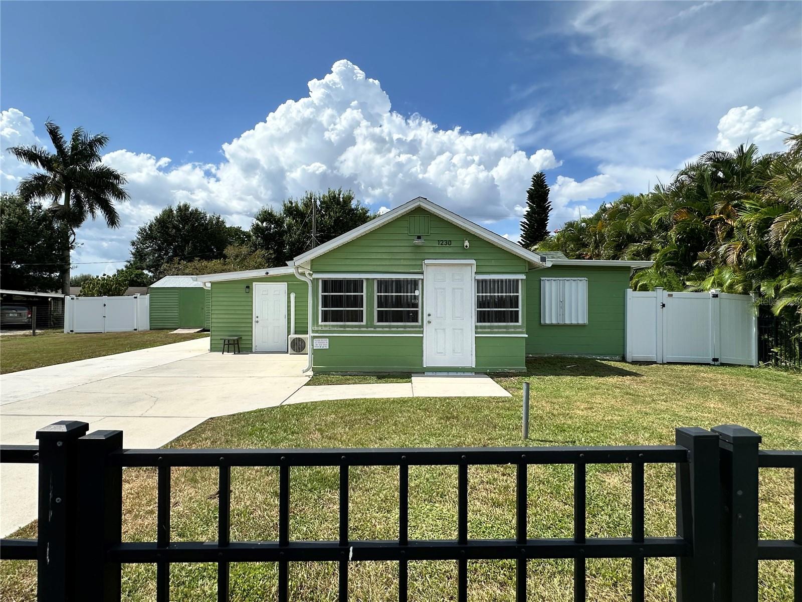 Single Family Residence em PUNTA GORDA, FL - Daniel Dourado