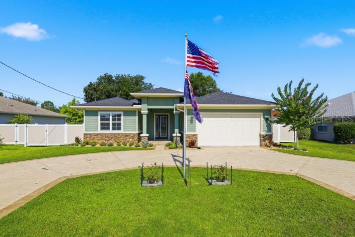 Single Family Residence em PALM COAST, FL - Daniel Dourado