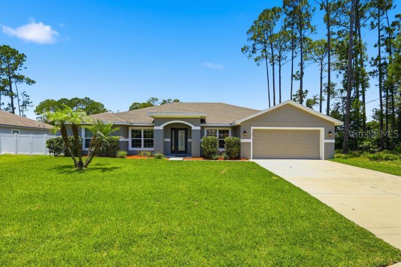 Single Family Residence em PALM COAST, FL - Daniel Dourado