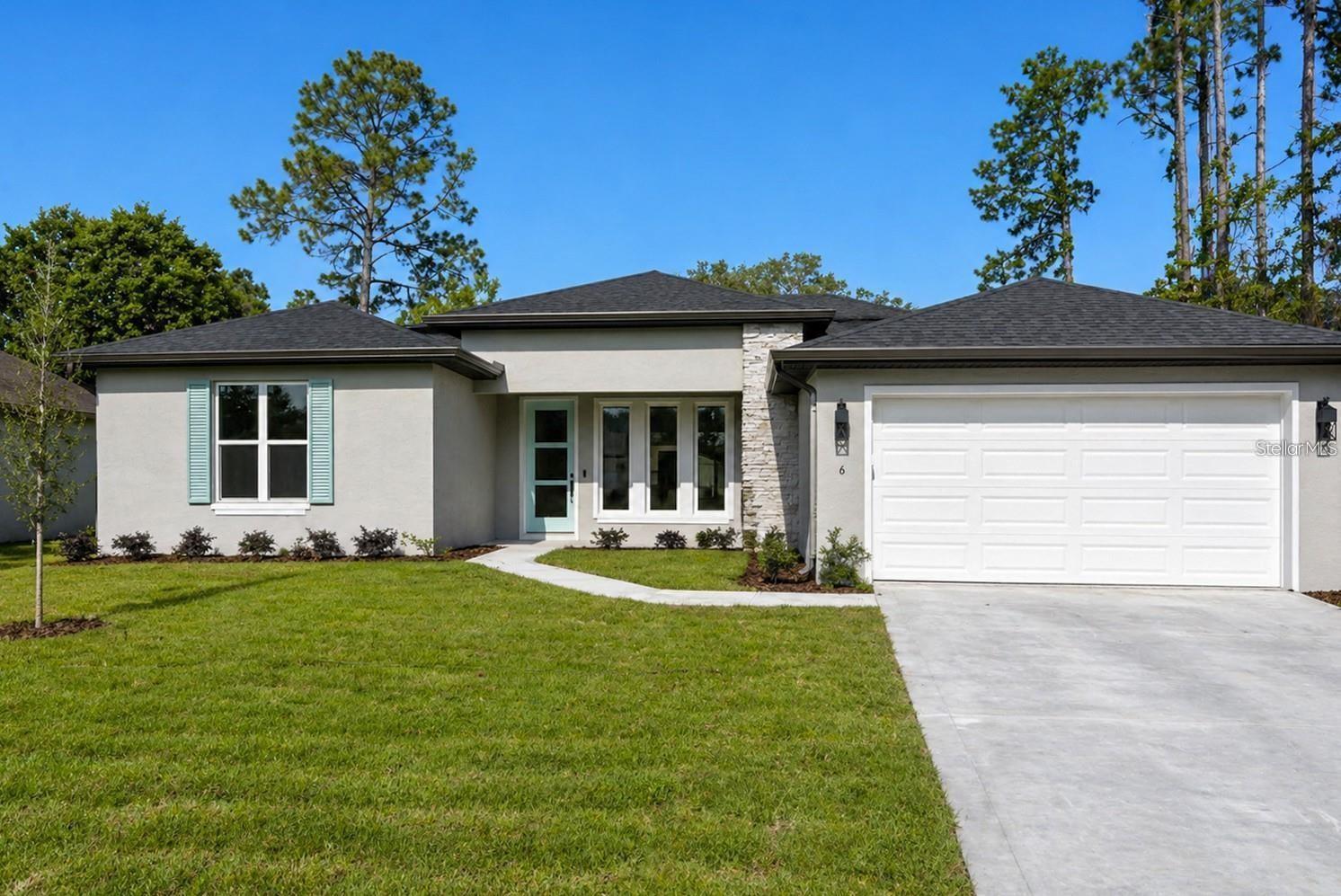 Single Family Residence em PALM COAST, FL - Daniel Dourado