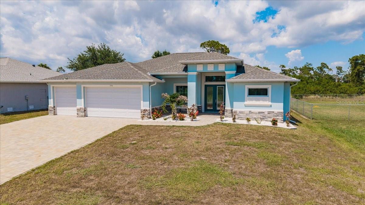 Single Family Residence in ROTONDA WEST, FL - Daniel Dourado