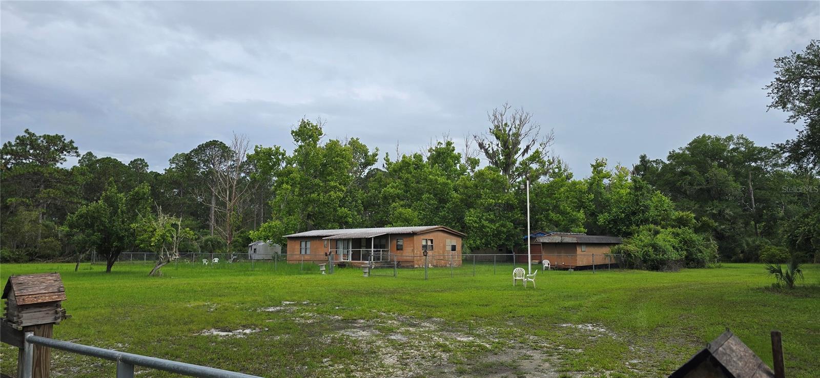 Single Family Residence em CEDAR KEY, FL - Daniel Dourado
