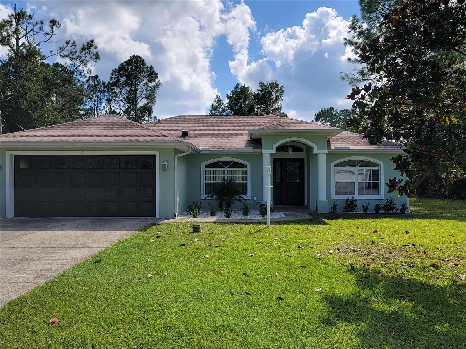 Single Family Residence em PALM COAST, FL - Daniel Dourado