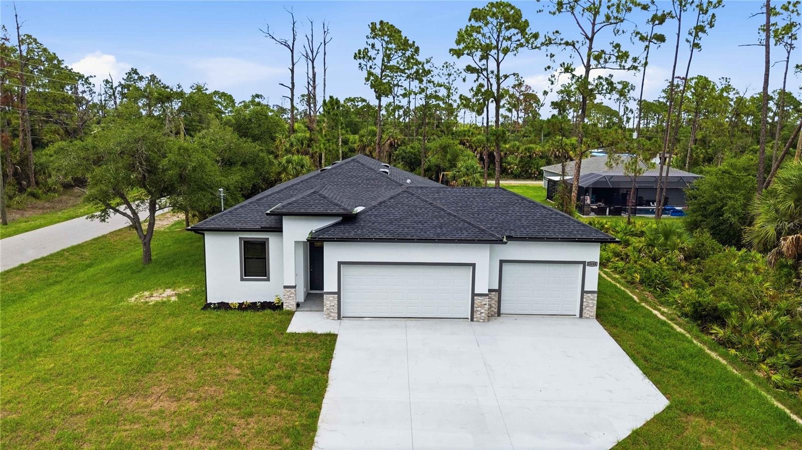 Single Family Residence in PORT CHARLOTTE, FL - Daniel Dourado