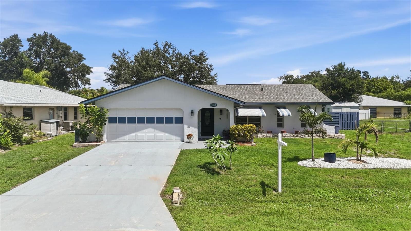 Single Family Residence em PORT CHARLOTTE, FL - Daniel Dourado