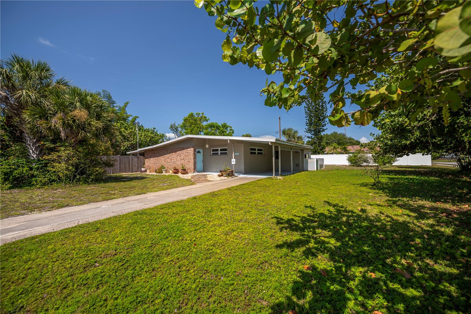 Single Family Residence em PUNTA GORDA, FL - Daniel Dourado