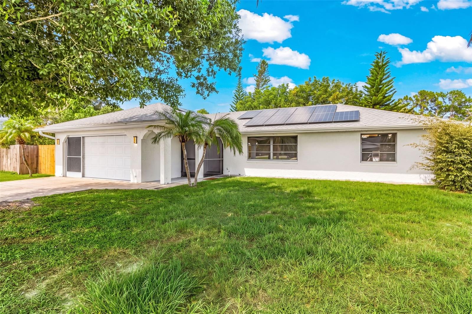 Single Family Residence em PORT CHARLOTTE, FL - Daniel Dourado
