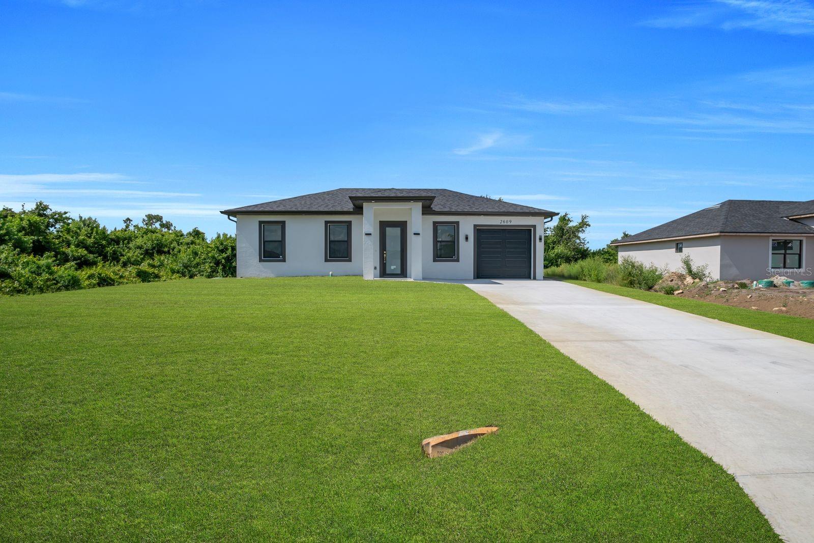 Single Family Residence em LEHIGH ACRES, FL - Daniel Dourado