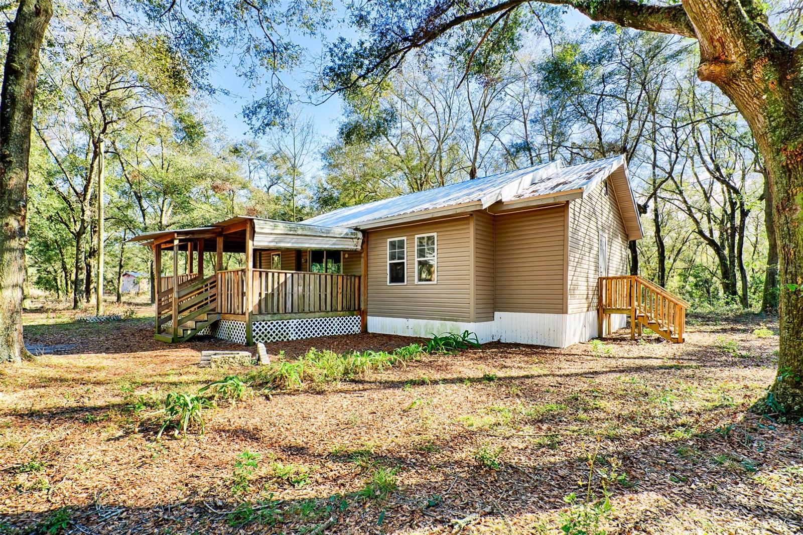 Single Family Residence em BELL, FL - Daniel Dourado