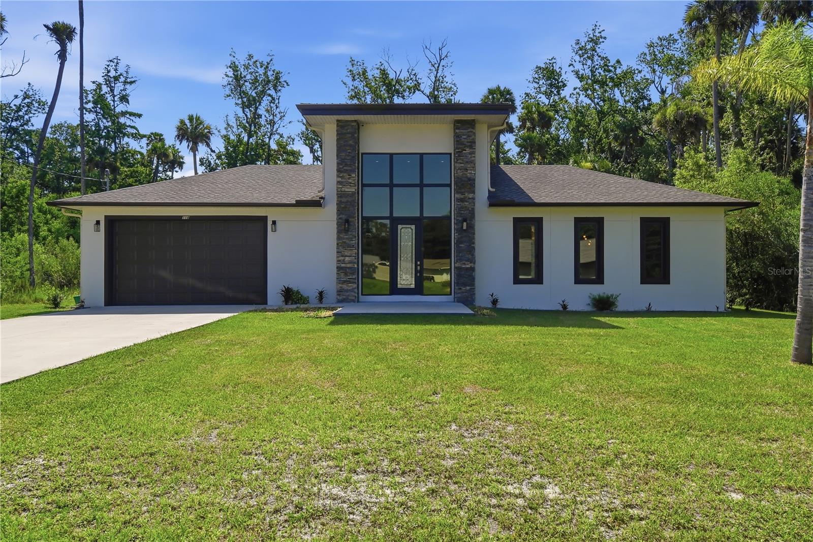 Single Family Residence em PALM COAST, FL - Daniel Dourado