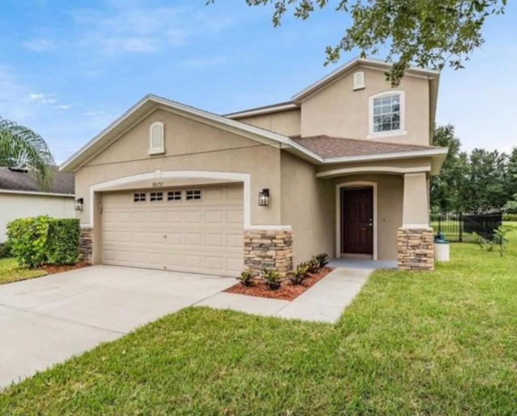 Single Family Residence em WESLEY CHAPEL, FL - Daniel Dourado