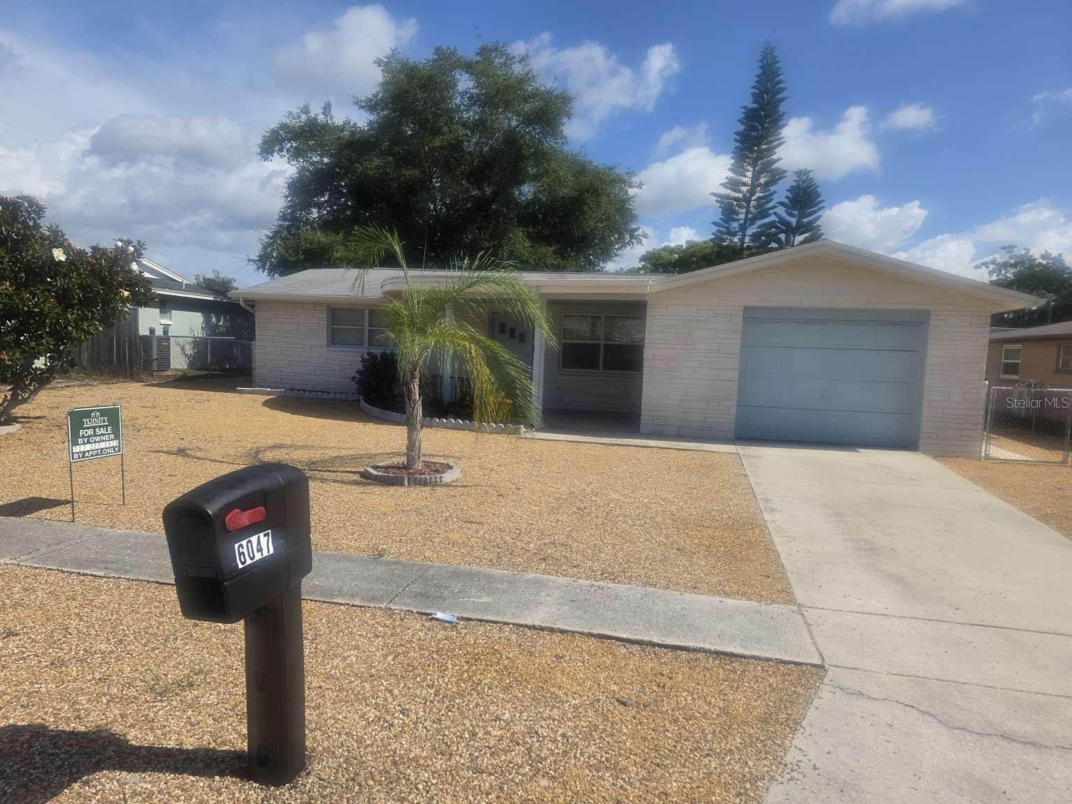 Single Family Residence in NEW PORT RICHEY, FL - Daniel Dourado