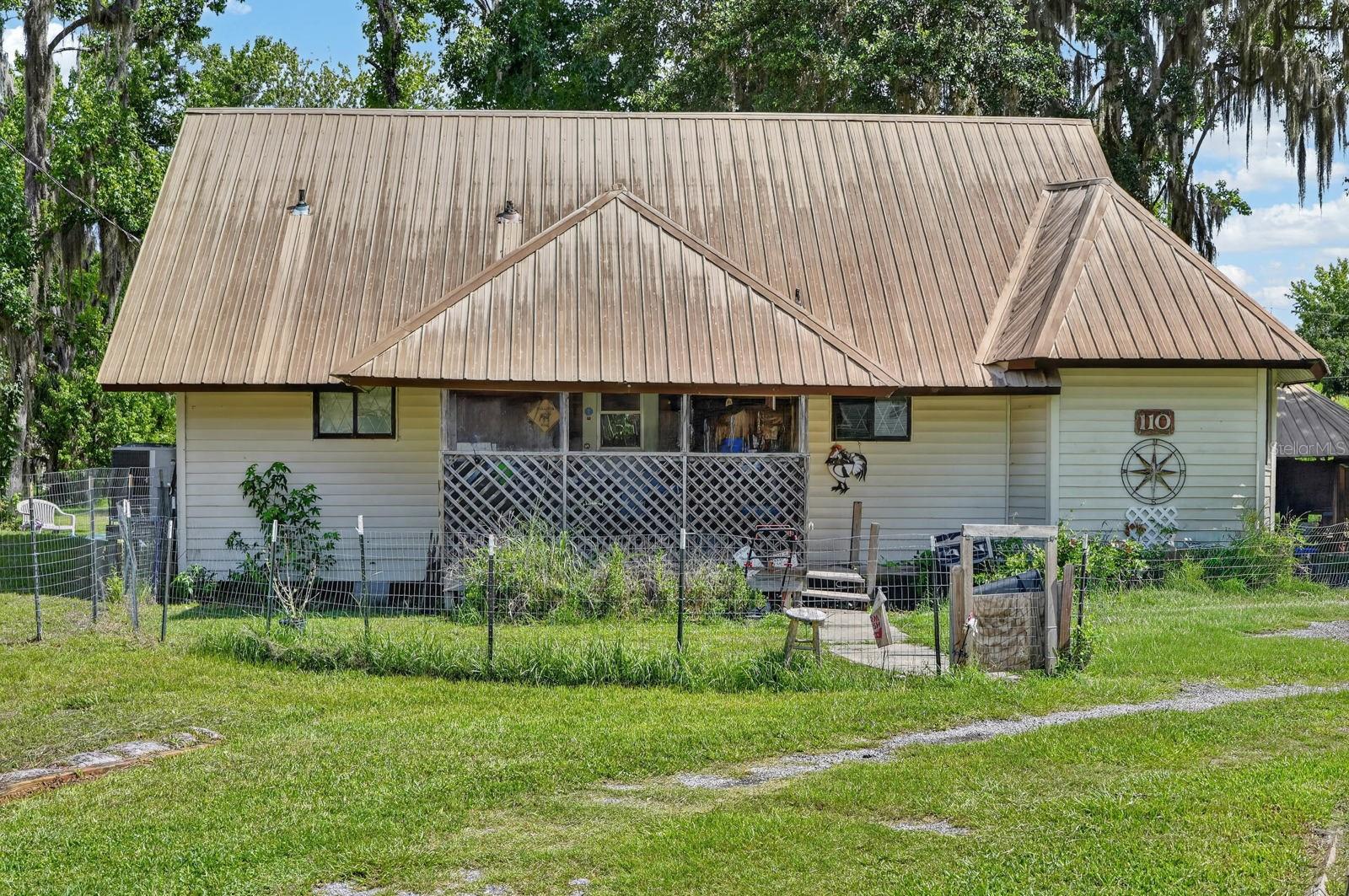 Single Family Residence em CRESCENT CITY, FL - Daniel Dourado