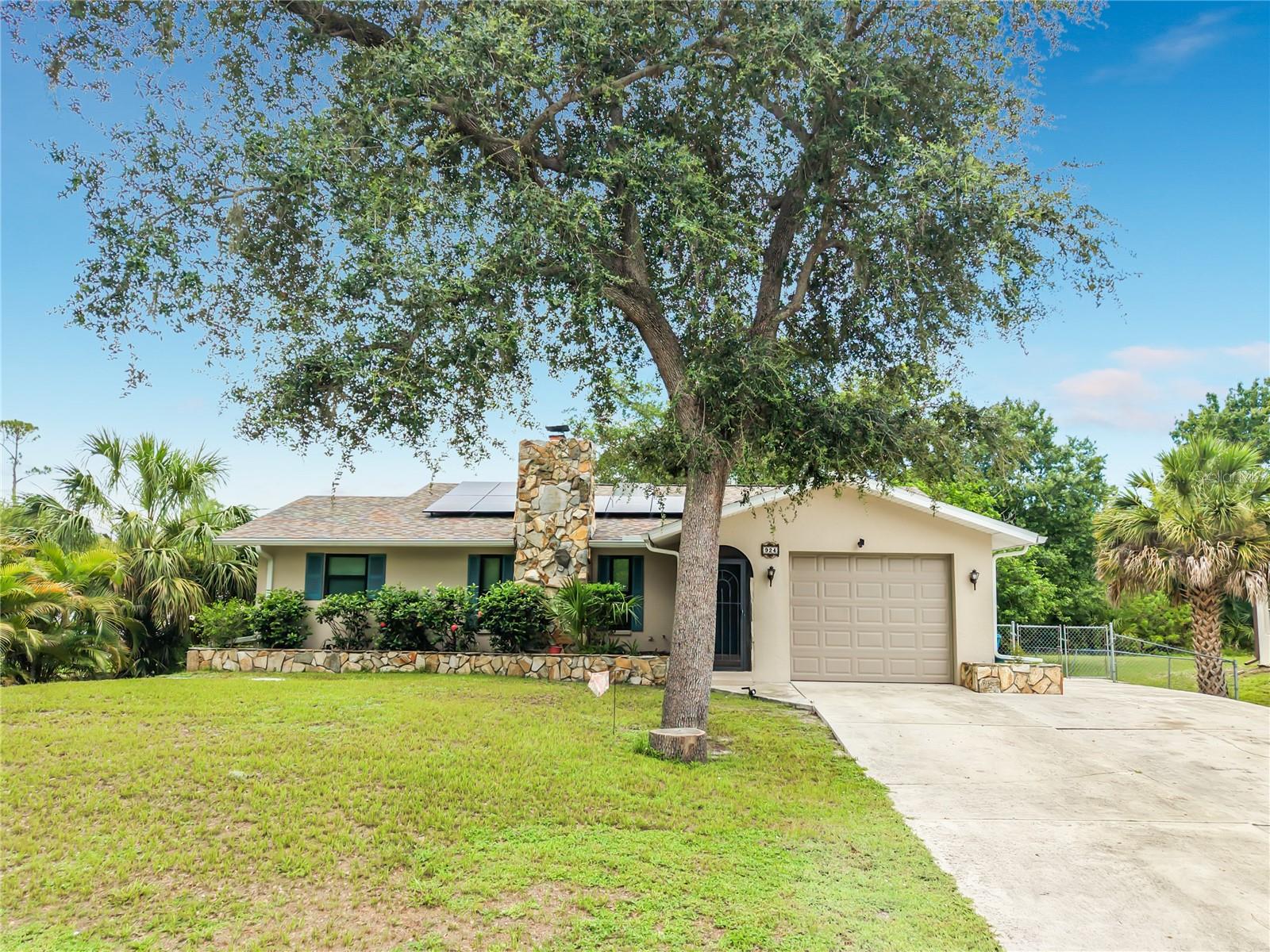 Single Family Residence in PORT CHARLOTTE, FL - Daniel Dourado
